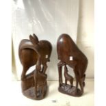 TWO CARVED AFRICAN FIGURES OF ANIMALS WITH THEIR FAWN; 46CM