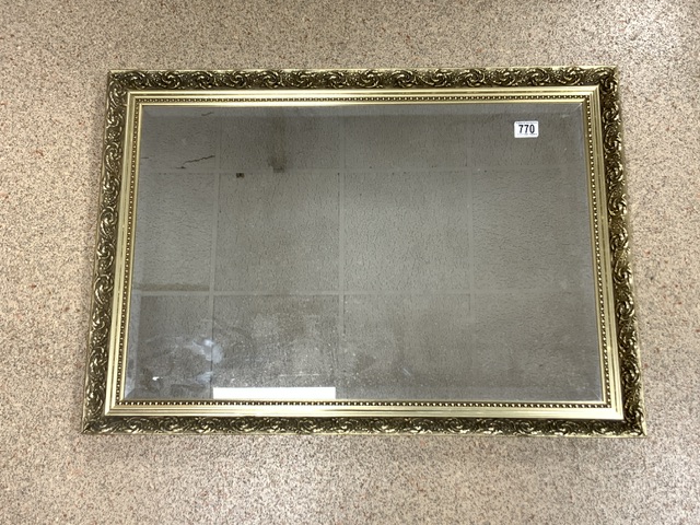 MODERN BEVELLED MIRROR IN A GILDED FRAME; 86 X 61CM