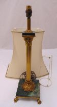 A gilt metal and marble table lamp of Corinthian column form to include a shade, 55.5cm (h)
