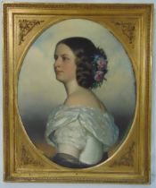 A framed oil on canvas of a 19th century portrait of a lady, auction label to verso, 71 x 58cm