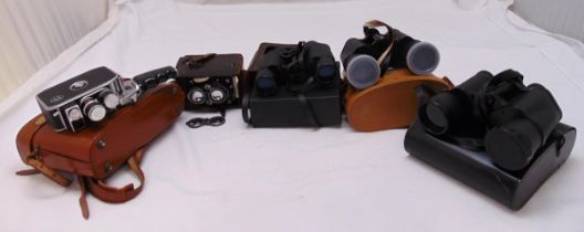 A quantity of binoculars and cameras some in fitted leather cases