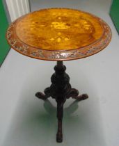 A Victorian circular mahogany and satinwood inlaid occasional table on three outswept legs, 75 x