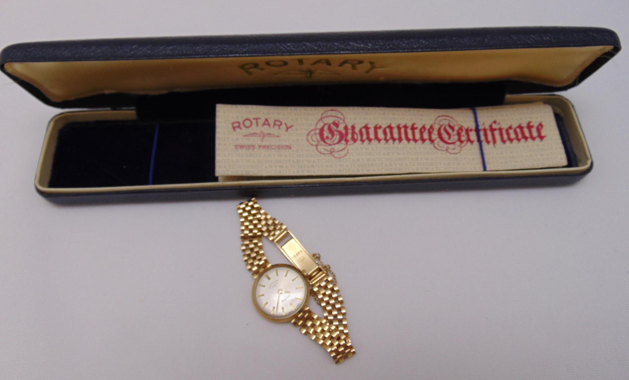 Rotary 9ct yellow gold ladies wristwatch on a 9ct gold articulated bracelet to include original