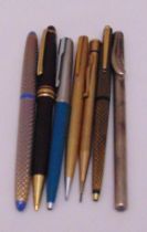 A quantity of writing implements to include Mont Blanc, Sheaffer, Dunhill, Yard O Led and Parker (