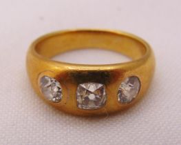 Gold three stone gypsy set diamond ring, tested 18ct, approx total weight 8.9g