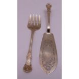 A pair of Victorian hallmarked silver fish servers, scroll pierced blades engraved with birds and
