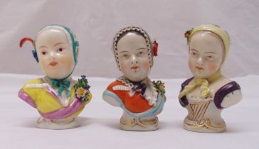 Two Dresden miniature busts of girls and a Vienna bust of a girl, all wearing head coverings,