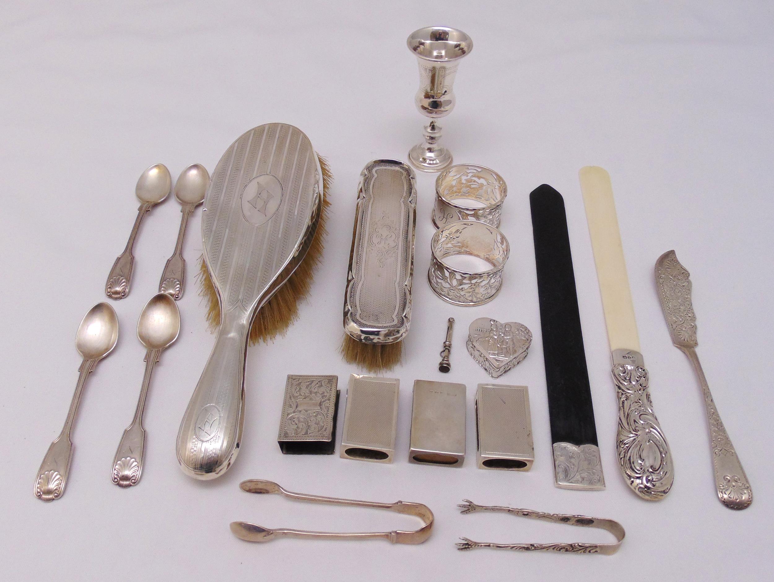 A quantity of hallmarked silver and white metal to include a Kiddush cup, two napkin rings, two