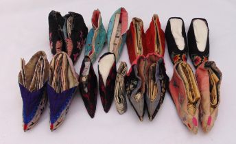 Eight pairs of Chinese late 19th/early 20th century silk embroidered Lotus shoes for bound feet