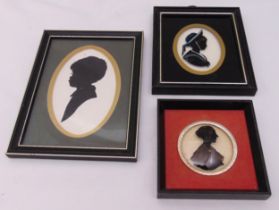 Three framed contemporary silhouettes