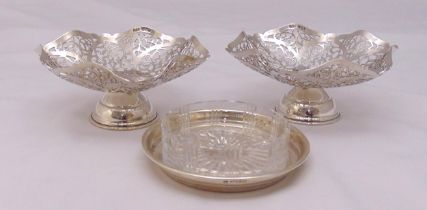 A quantity of hallmarked silver to include two pierced bonbon dishes and a coaster