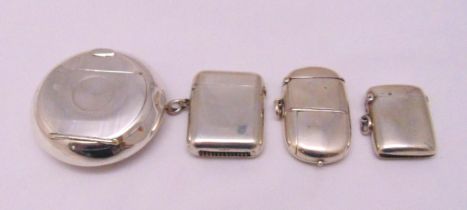 Three hallmarked silver vesta cases, various shape, form and decoration and a vesta case cum tobacco