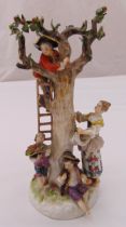 Meissen figural group of apple pickers, on raised naturalistic base, marks to the base, slight