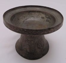 An early Persian silvered copper bowl of circular form on flared conical base, the sides inscribed