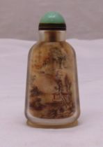 A Chinese reverse painted snuff bottle decorated with a landscape, 9cm (h)
