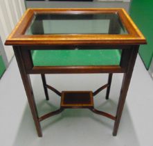 An Edwardian rectangular mahogany and glass display table on tapering rectangular legs, 76.5 x 58