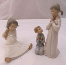 Two Lladro figurines of children, marks to the bases, tallest 22cm (h)