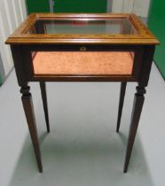 An Edwardian rectangular mahogany and glass display table on four tapering rectangular legs, 76 x 51