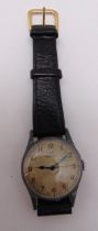 Omega 1950s gentlemans wristwatch with leather strap