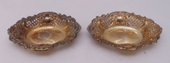 Two hallmarked silver shaped oval pierced bonbon dishes, London 1979