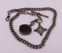 A hallmarked silver fob chain with spinning quartz, a hallmarked silver St John Ambulance pendant,