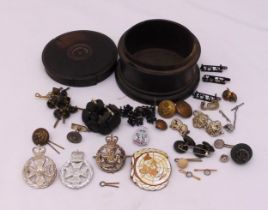 A quantity of military and other badges, brooches and buttons, to include silver Peninsula badge, in