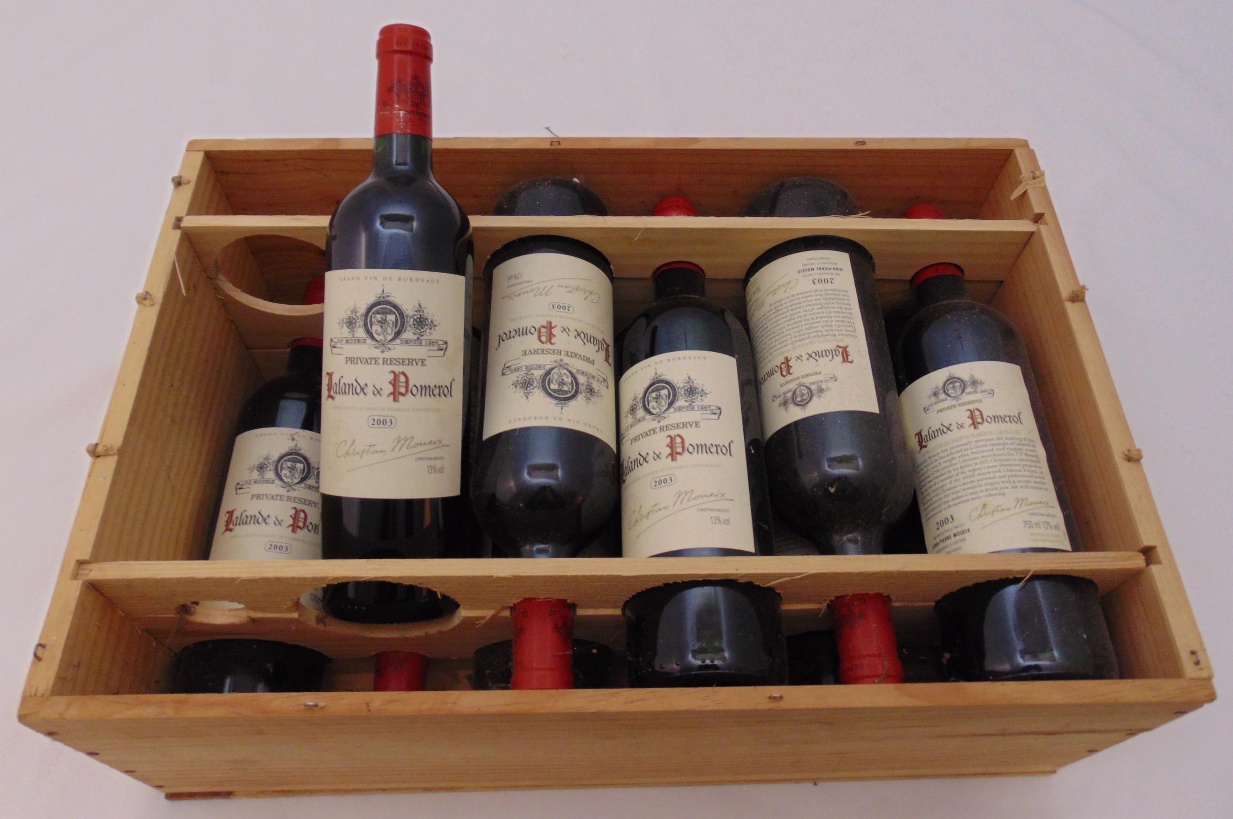 Eleven bottles of Jean-Pierre Moueix Lalande de Pomerol 2003 75cl