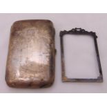 A hallmarked silver cigar case and a hallmarked silver photograph frame, approx total weight 163g