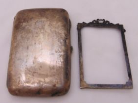 A hallmarked silver cigar case and a hallmarked silver photograph frame, approx total weight 163g