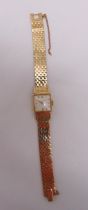 Jaeger LeCoultre 9ct gold ladies wristwatch on 9ct gold articulated bracelet, approx total weight