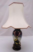Moorcroft table lamp of baluster form decorated with flowers to include shade, 44cm (h) ex shade,