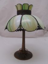 A Tiffany style glass and metal table top lamp on raised circular base, 62cm (h)