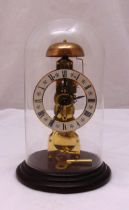Hermle 791-680 West German bell-strike pendulum skeleton clock in glass dome with key, 27cm (h)