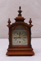 A German Black Forest mantle clock silvered dial, Roman numerals, single train movement, to