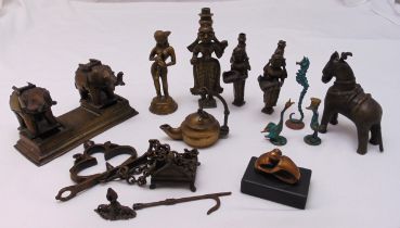 A quantity of antique brass/bronze oriental ornaments to include an inkwell and stylised