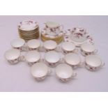 Minton Ancestral twelve place setting teaset to include cups, saucers, plates, a cake plate, a