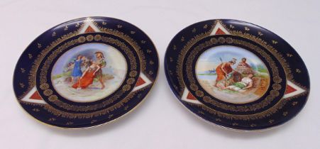 A pair of early20th century Vienna porcelain wall plates by Ackermann and Fritze decorated with