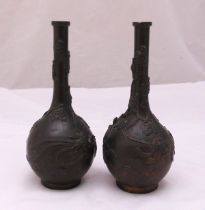 A pair of Oriental bronze vases with applied birds, flowers and leaves, 24cm (h)