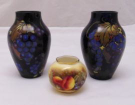 A pair of Royal Stanley Ware vases decorated with vines and a Royal Worcester miniature vase