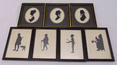 Seven framed and glazed silhouettes to include Dickensian characters