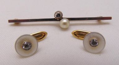 Two 14ct yellow gold and diamond button studs and a 14ct yellow gold diamond and pearl tie pin