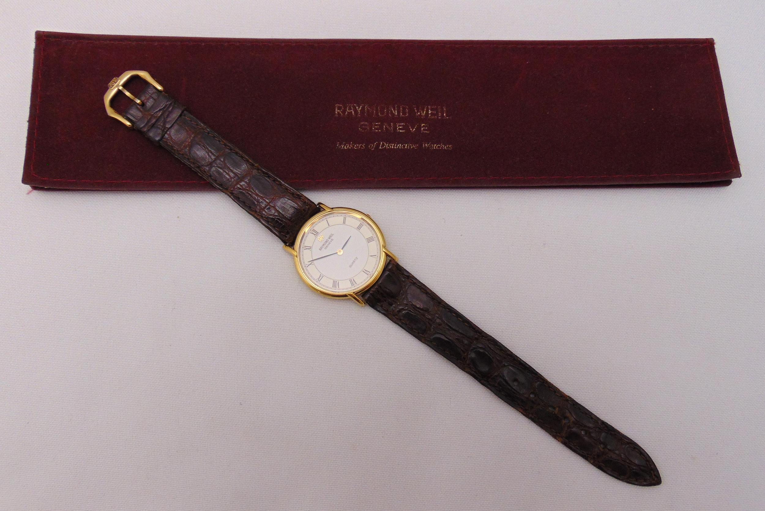 Raymond Weil Geneve gold plated quartz wristwatch on a leather strap