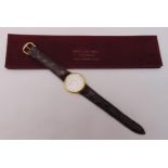 Raymond Weil Geneve gold plated quartz wristwatch on a leather strap