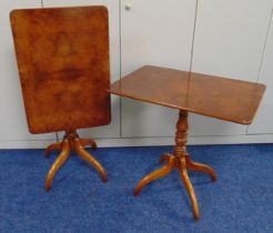A pair of rectangular mahogany and walnut tilt top tables on four outswept legs, each 72 x 76 x 53.