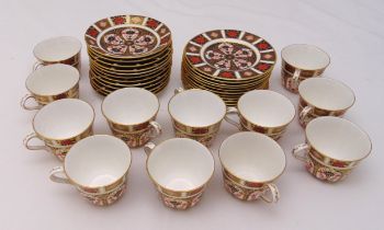 Royal Crown Derby Imari pattern teaset for twelve place settings to include plates cups and