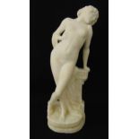 Seger marble figurine of a nude lady on shaped oval base, label to verso for M Klein of Paris , 27cm