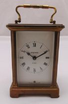 Bayard 8 day carriage clock with carrying handle by Duverdey and Bloquel, white enamel dial with