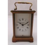 Bayard 8 day carriage clock with carrying handle by Duverdey and Bloquel, white enamel dial with