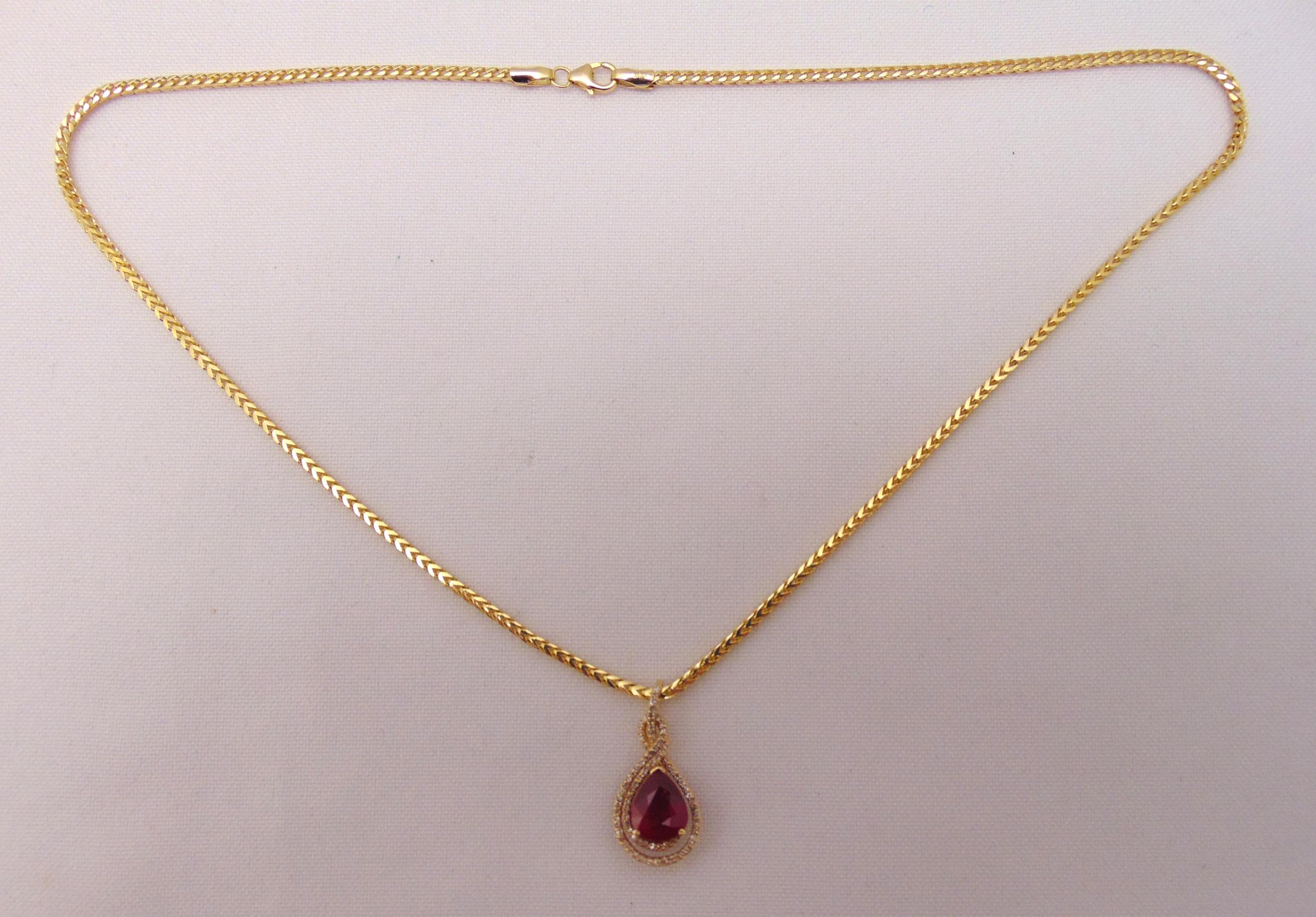 14ct yellow gold, ruby and diamond pendant on a 14ct yellow gold chain, approx total weight 11.6g