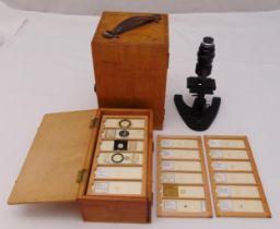 A quantity of microscope slides in fitted wooden case, approx 75 and a Britex mirror microscope in